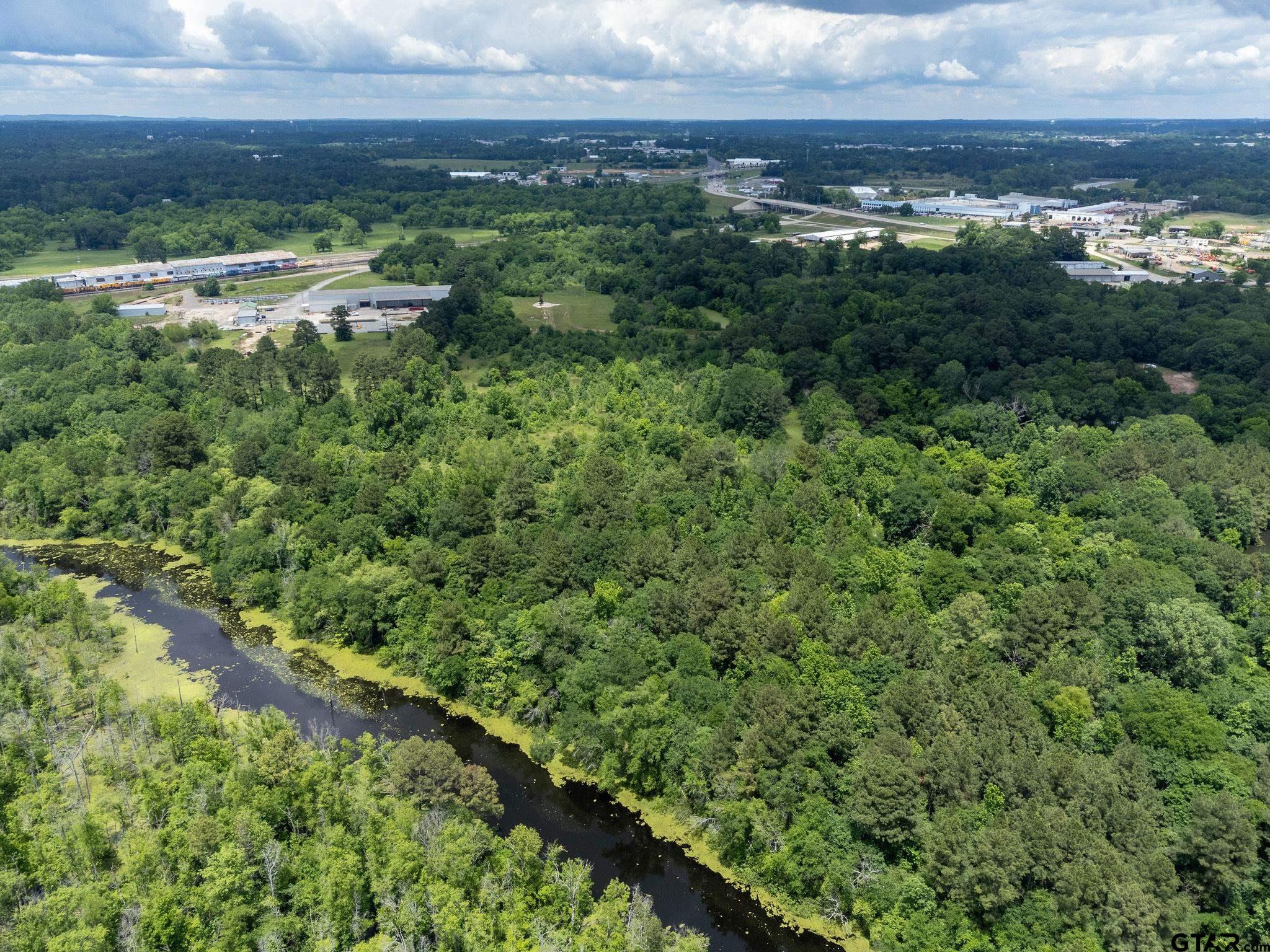 Tbd Dancinger Road Longview, TX 75603 - Photo 13 of 21 a view of a lake with a city