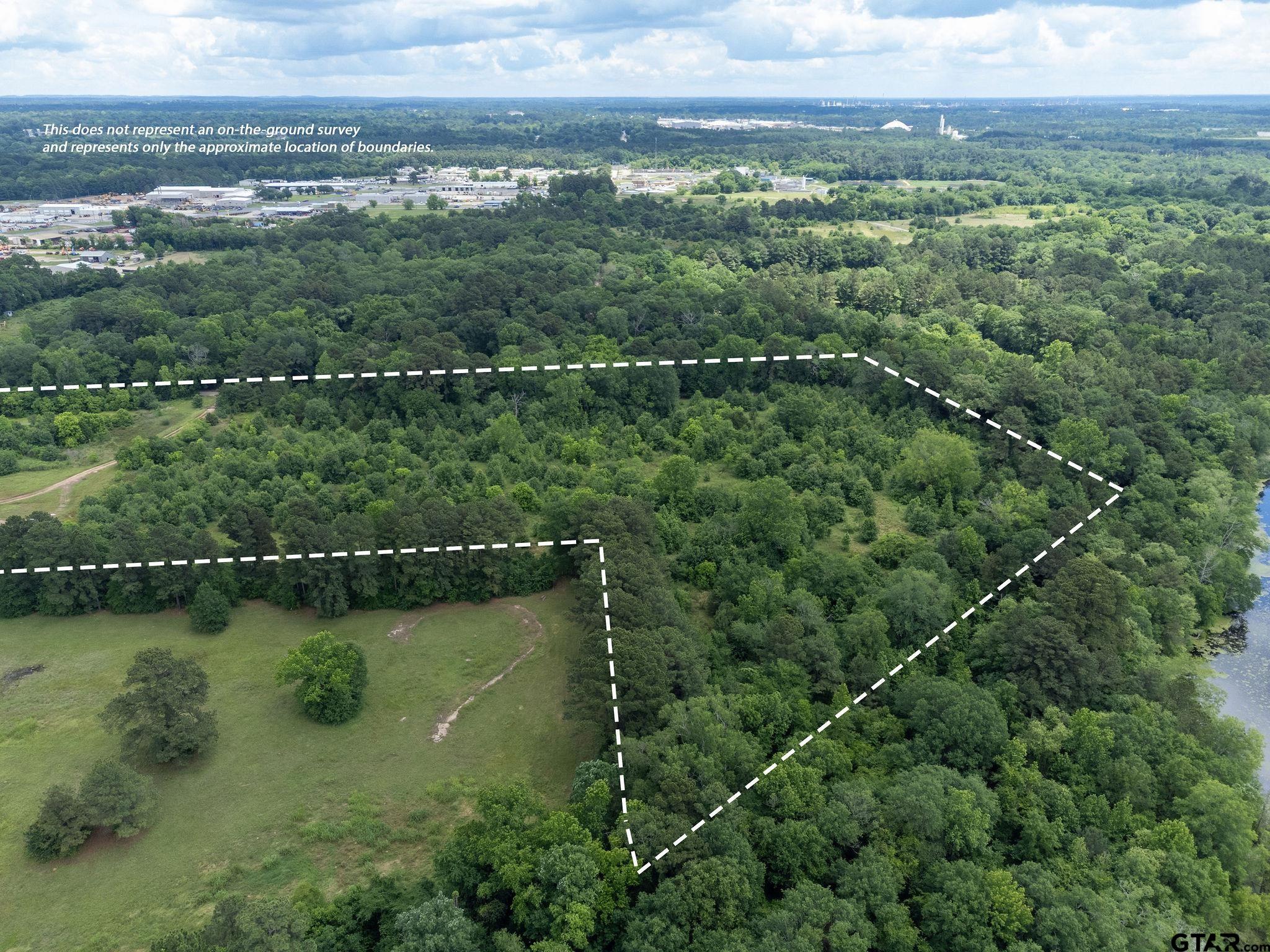 Tbd Dancinger Road Longview, TX 75603 - Photo 14 of 21 an aerial view of residential houses with outdoor space and lake view