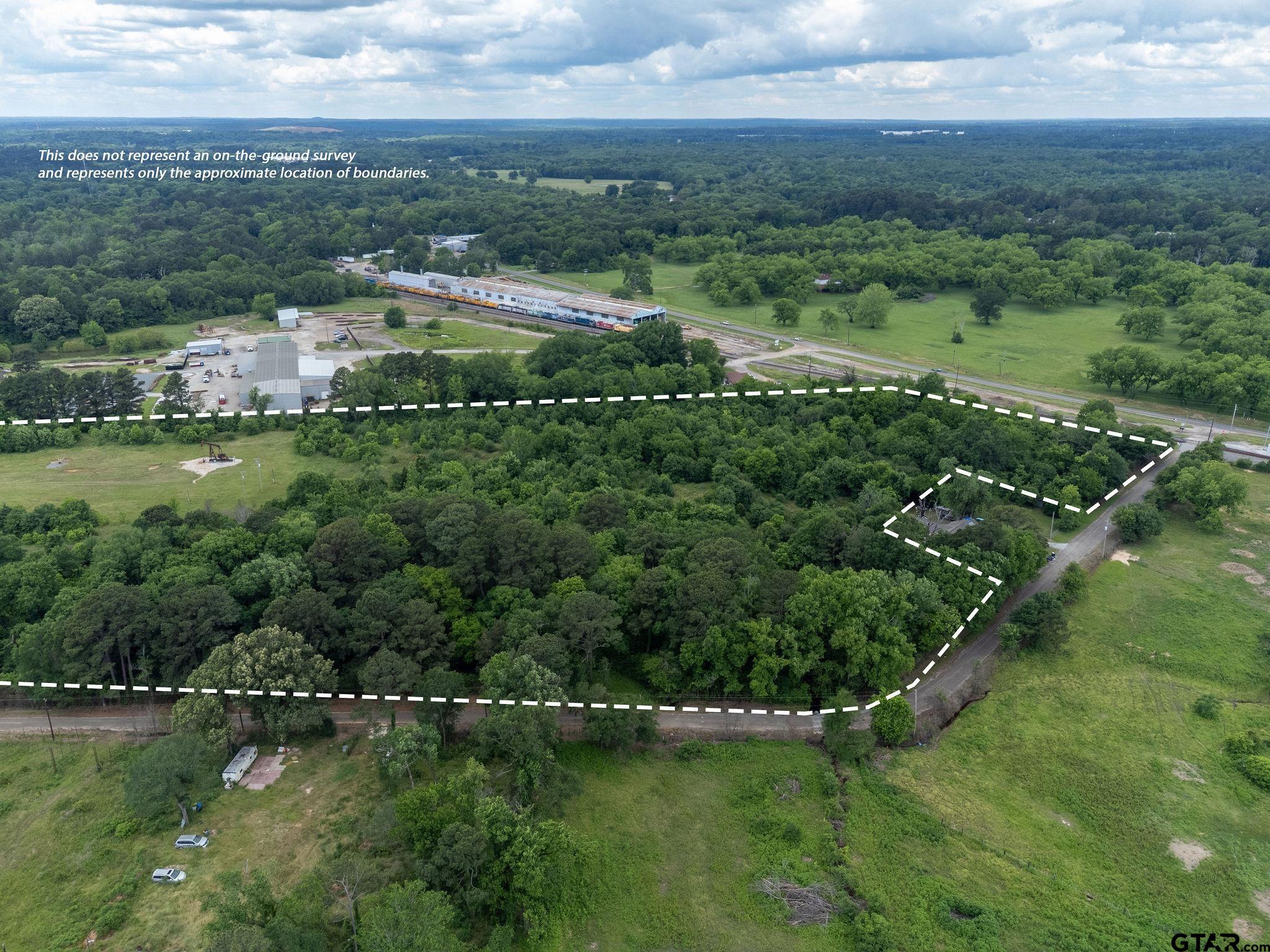 Tbd Dancinger Road Longview, TX 75603 - Photo 18 of 21 a view of a lake with a city