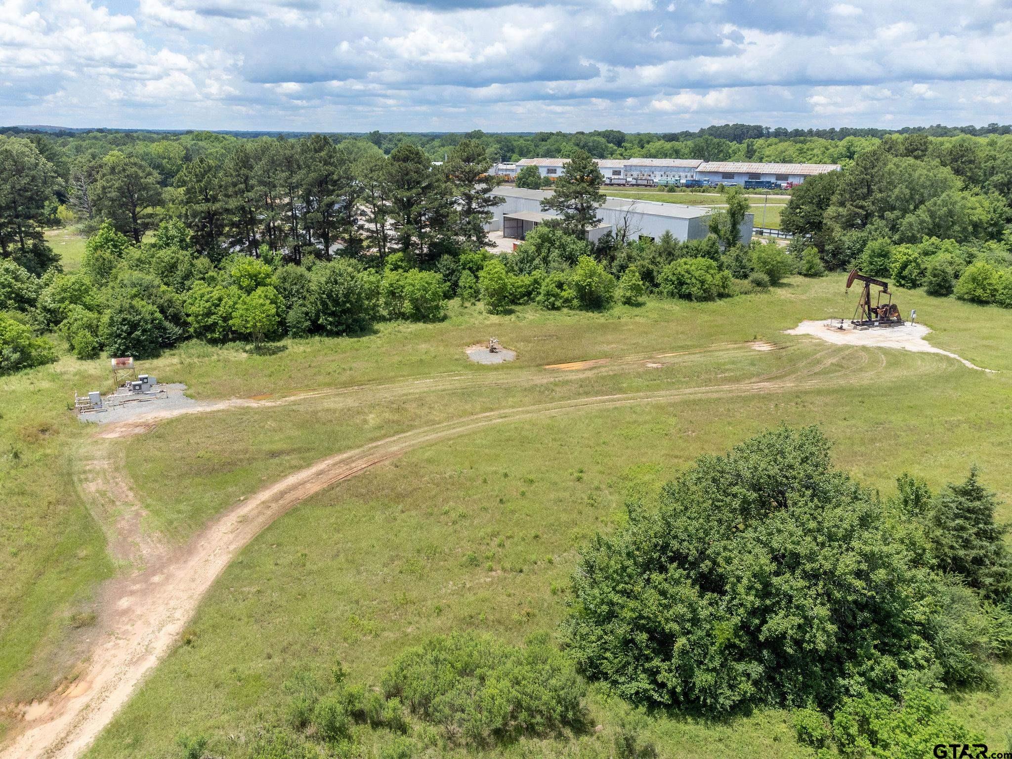 Tbd Dancinger Road Longview, TX 75603 - Photo 3 of 21 a view of a lake with outdoor space