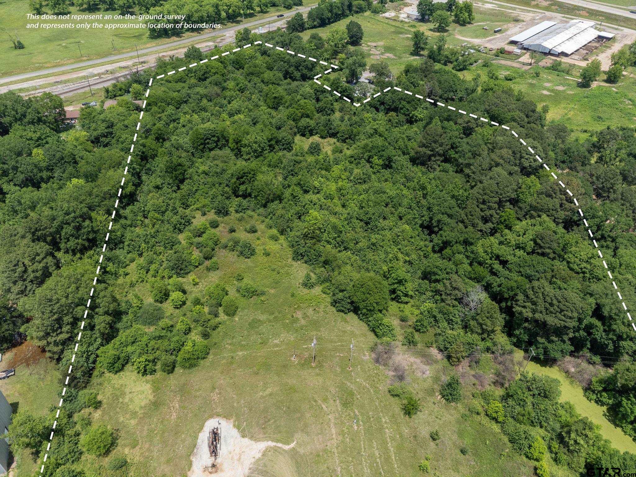 Tbd Dancinger Road Longview, TX 75603 - Photo 4 of 21 a view of a lake from a forest