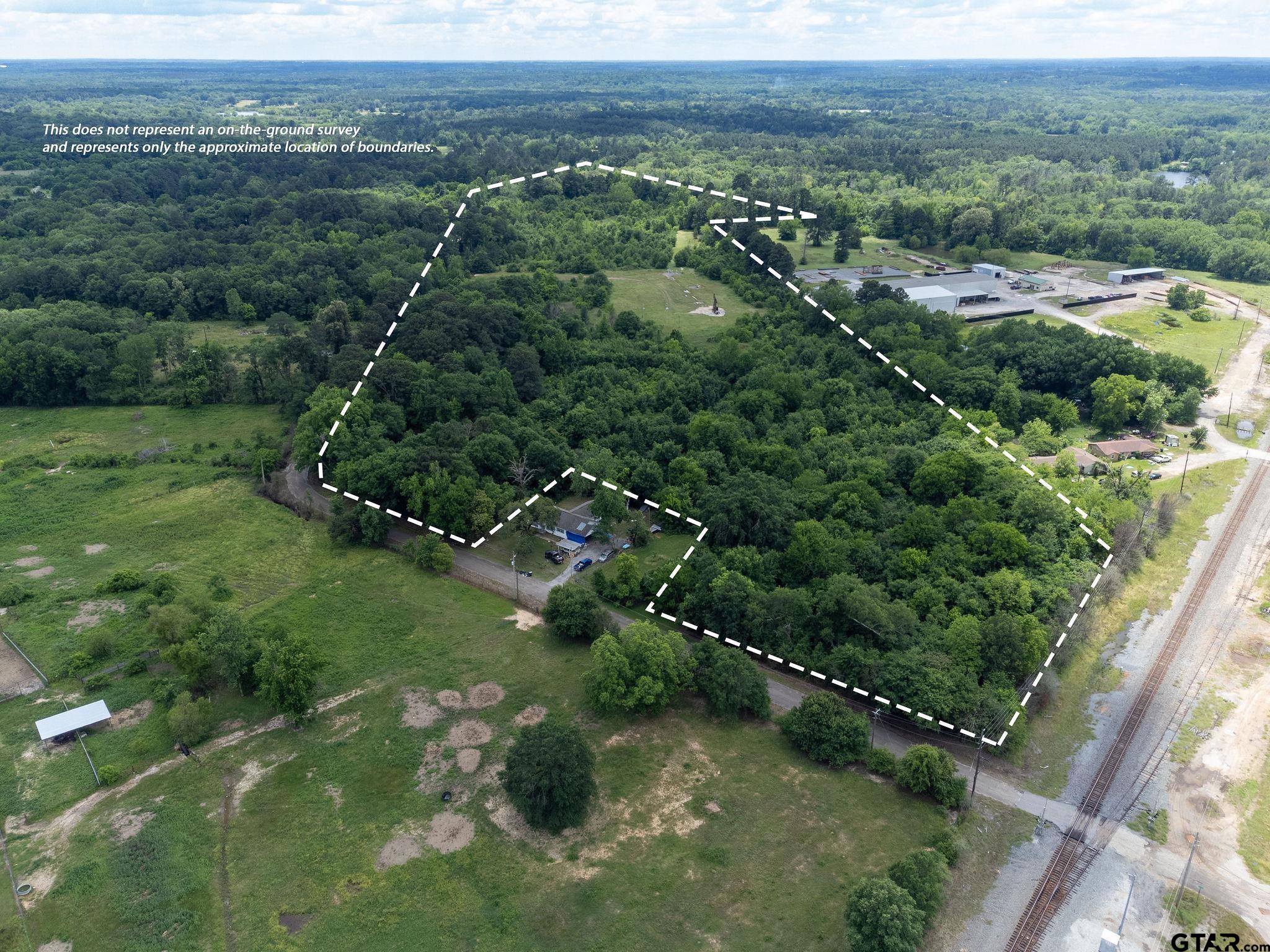 Tbd Dancinger Road Longview, TX 75603 - Photo 10 of 21 an aerial view of residential houses with outdoor space and trees