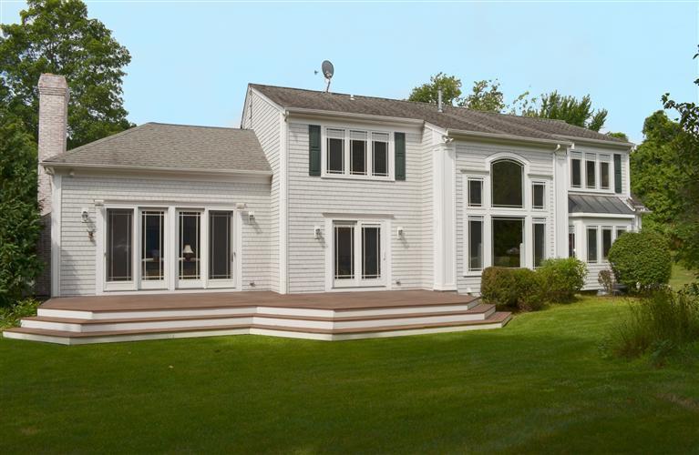 1480 South County Road Osterville, MA 02655 - Photo 11 of 12 a front view of a house with a yard