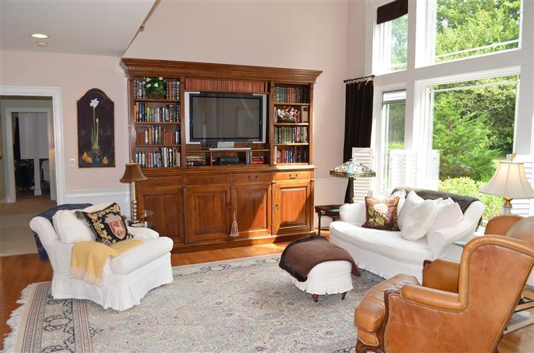 1480 South County Road Osterville, MA 02655 - Photo 4 of 12 a living room with furniture fireplace and a large window