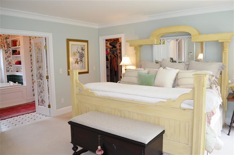 1480 South County Road Osterville, MA 02655 - Photo 7 of 12 a bedroom with a bed and a mirror