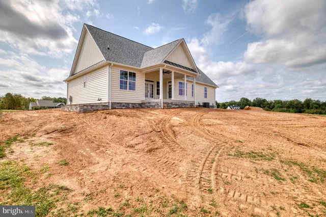 a view of a lake with a yard