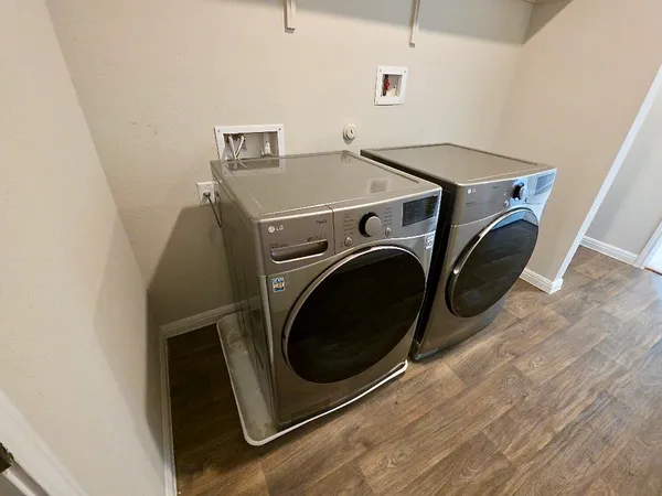 a utility room with dryer and washer