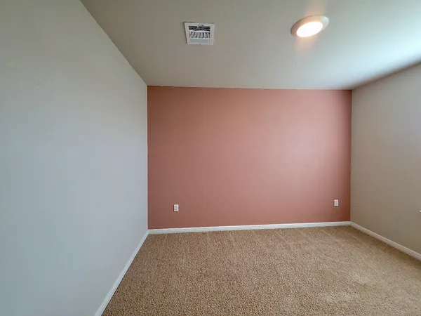 an empty room with a workbench