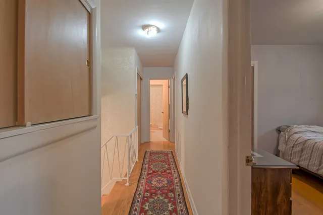 a view of hallway with stairs