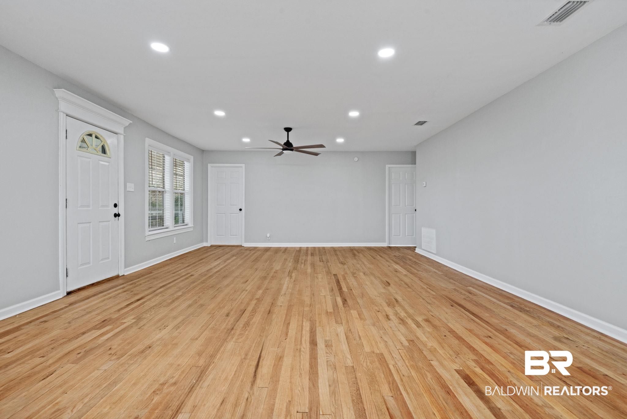 13461 Tom Gaston Road Mobile, AL 36695 - Photo 19 of 41 Unfurnished living room with recessed lighting, light wood-style flooring, and ceiling fan