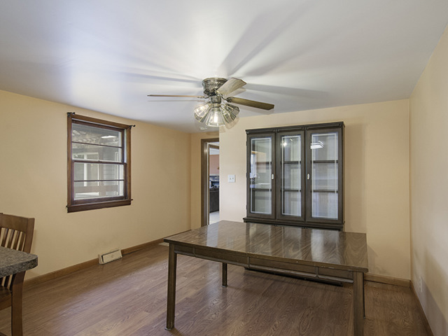 1685 Sheffer Road Aurora, IL 60505 - Photo 4 of 15 a view of an empty room with a window