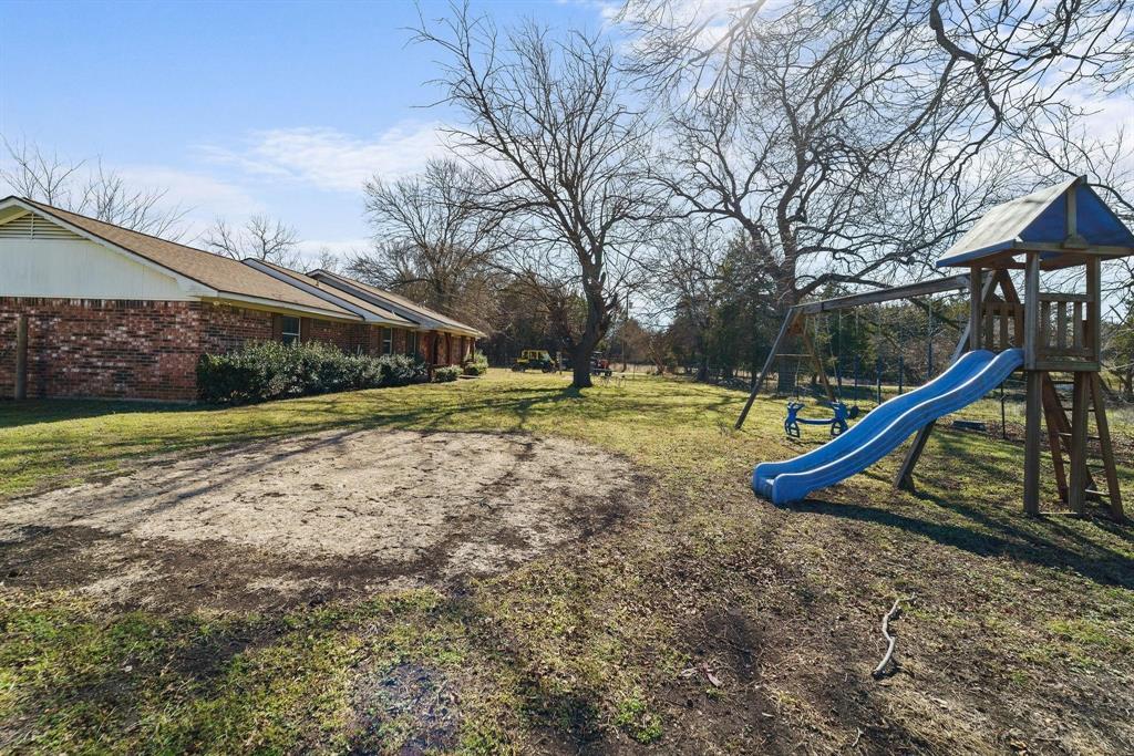 1006 South Clark Road Cedar Hill, TX 75104 - Photo 21 of 29 a view of a house with a park