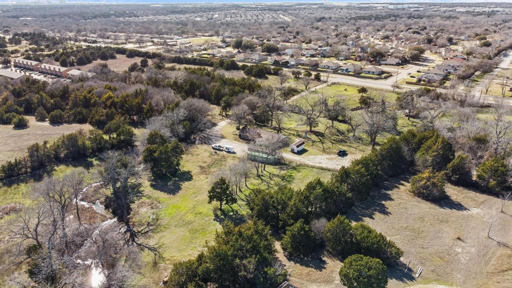 1006 South Clark Road Cedar Hill, TX 75104 - Photo 27 of 29 an aerial view of residential house with parking space