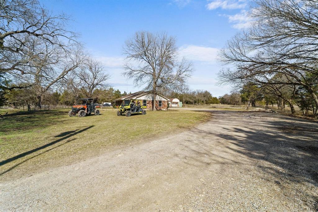1006 South Clark Road Cedar Hill, TX 75104 - Photo 9 of 29 a view of road with trees