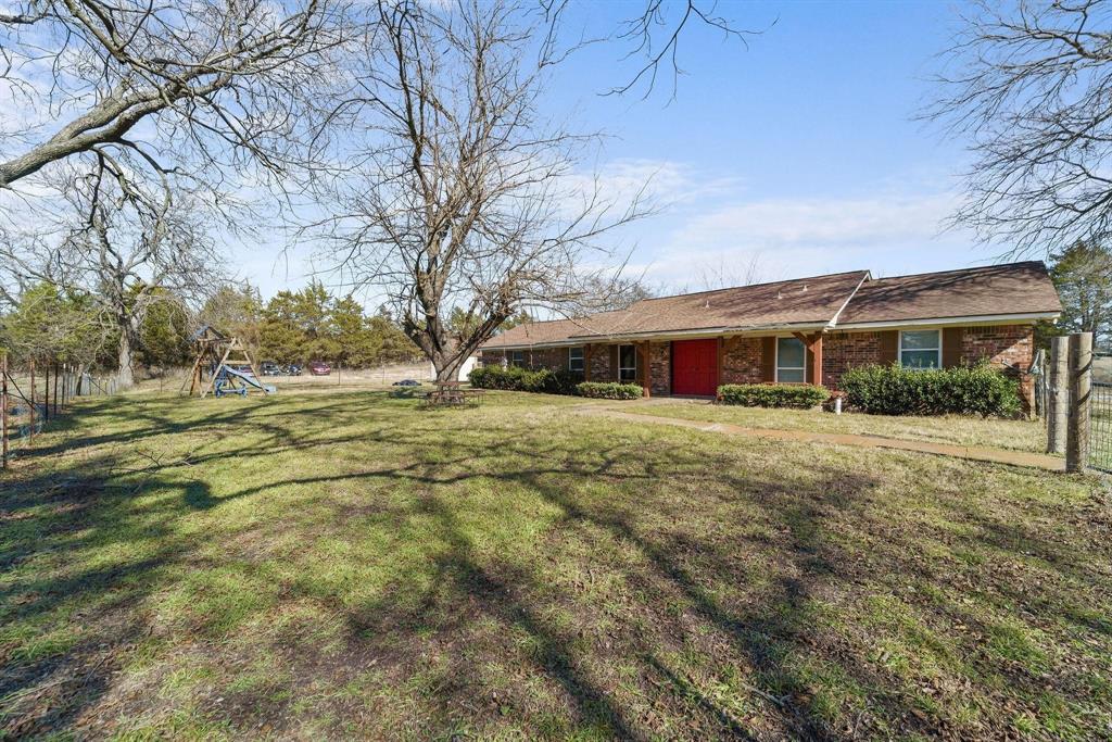1006 South Clark Road Cedar Hill, TX 75104 - Photo 10 of 29 a front view of house with yard