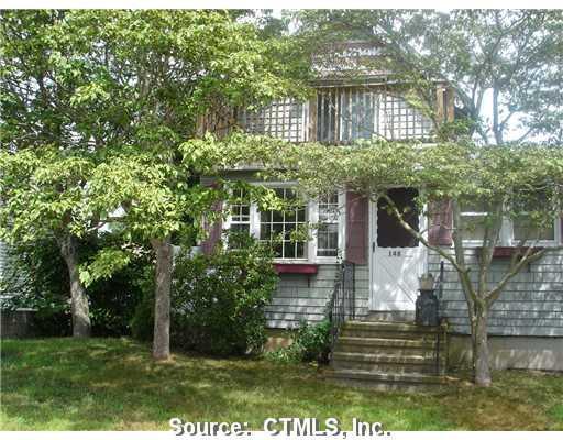 148 Salt Island Road Westbrook, CT 06498 - Photo 1 of 1 front view of a house with a yard
