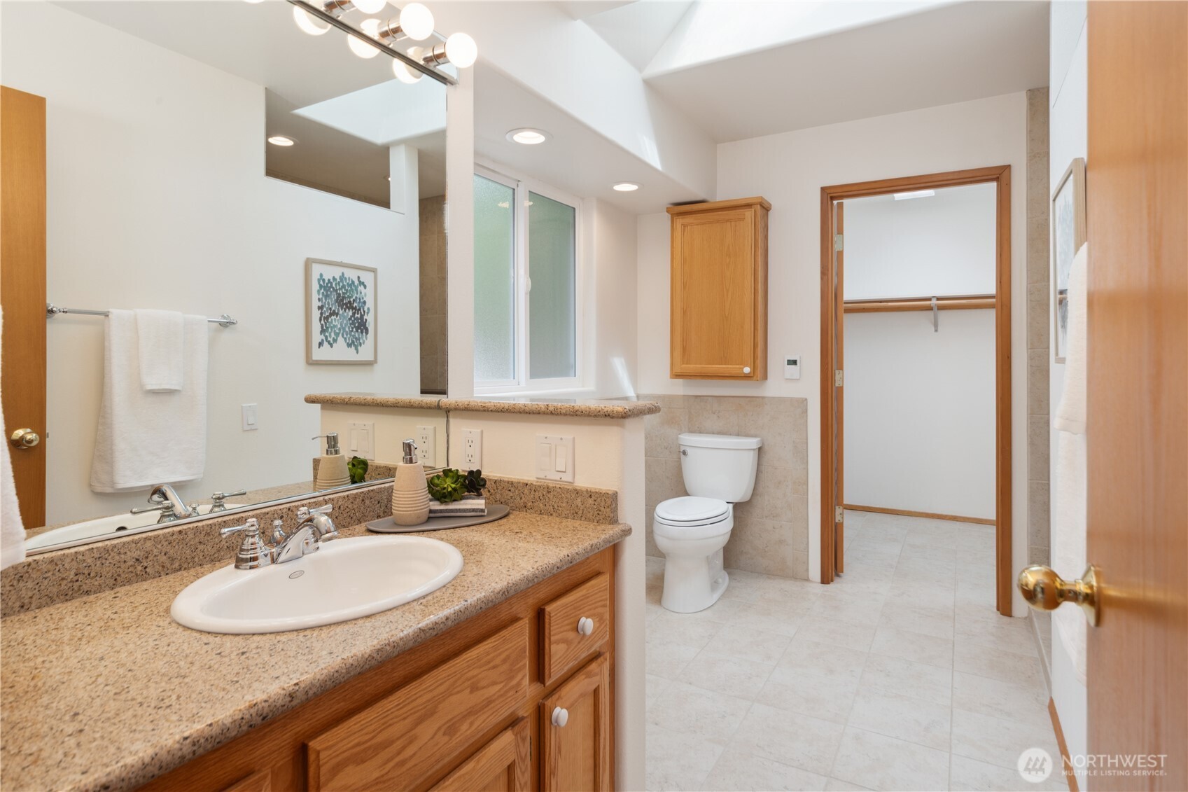 2882 Beaver Valley Road Port Ludlow, WA 98365 - Photo 15 of 34 a bathroom with a sink and a mirror