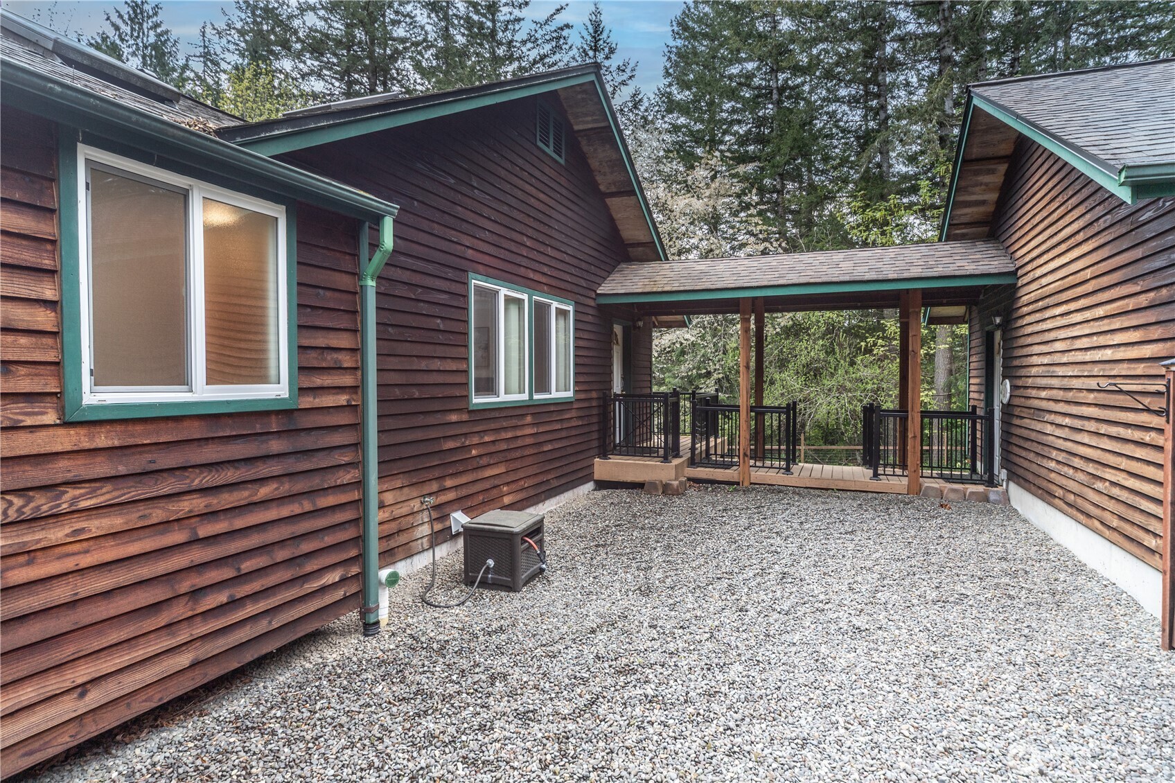 2882 Beaver Valley Road Port Ludlow, WA 98365 - Photo 27 of 34 a view of a house with a backyard