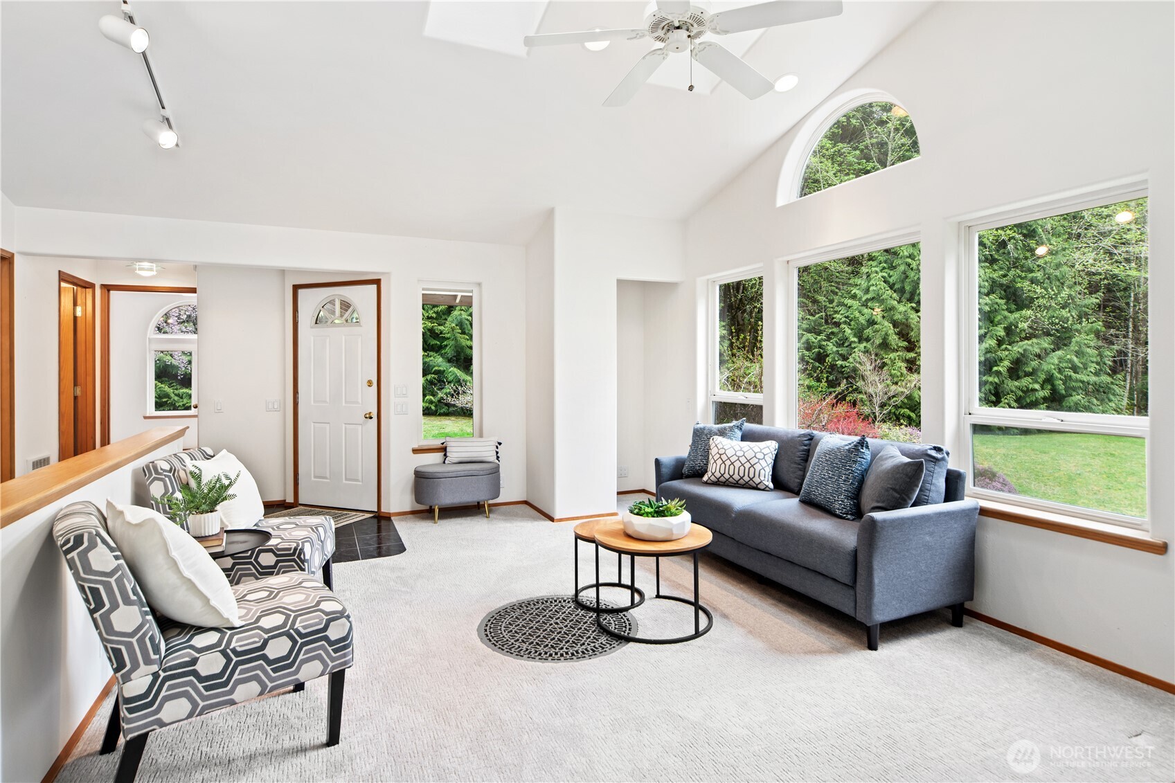 2882 Beaver Valley Road Port Ludlow, WA 98365 - Photo 3 of 34 a living room with furniture and a large window
