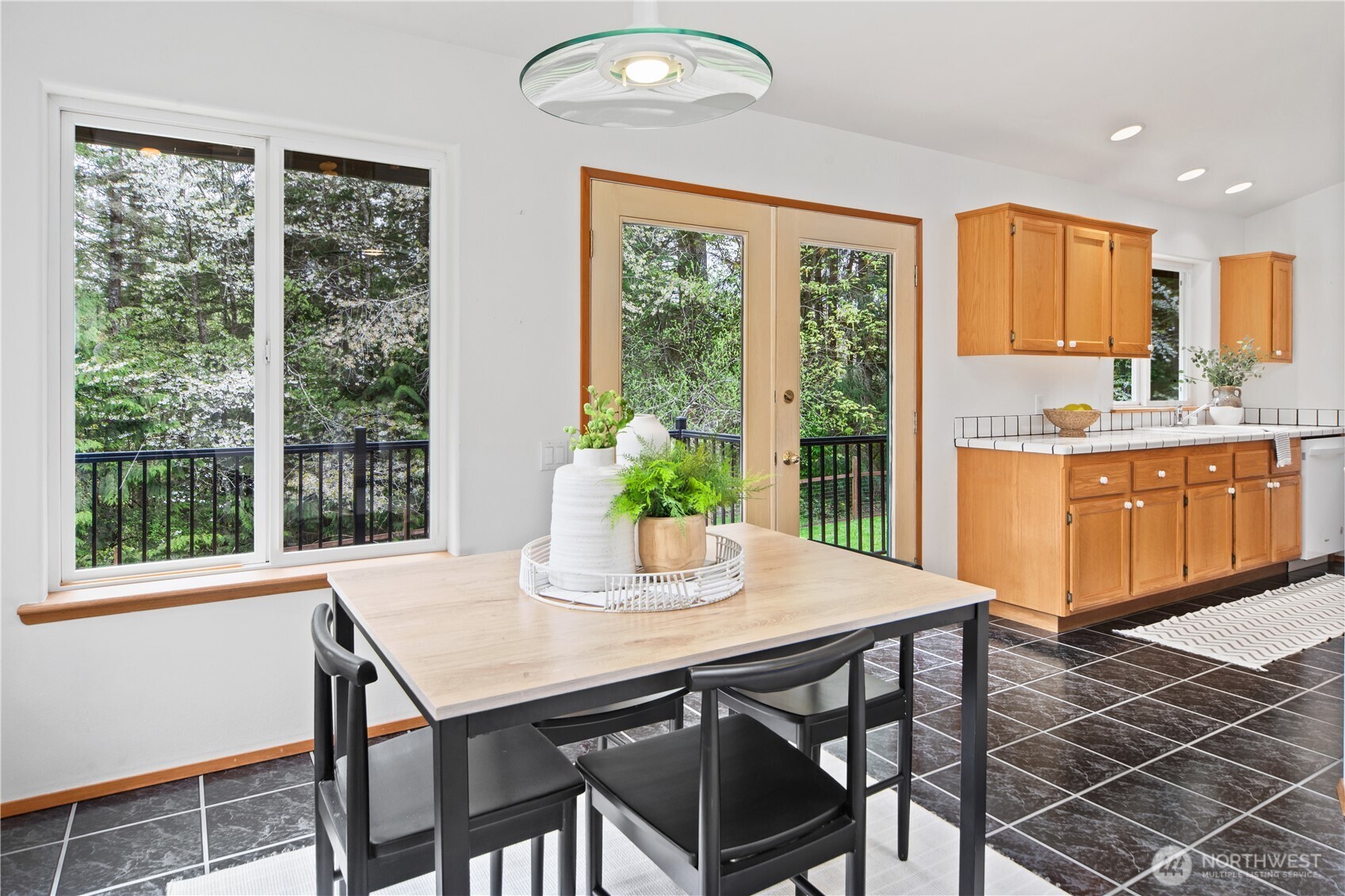 2882 Beaver Valley Road Port Ludlow, WA 98365 - Photo 6 of 34 a view of a dining room with furniture window and outside view