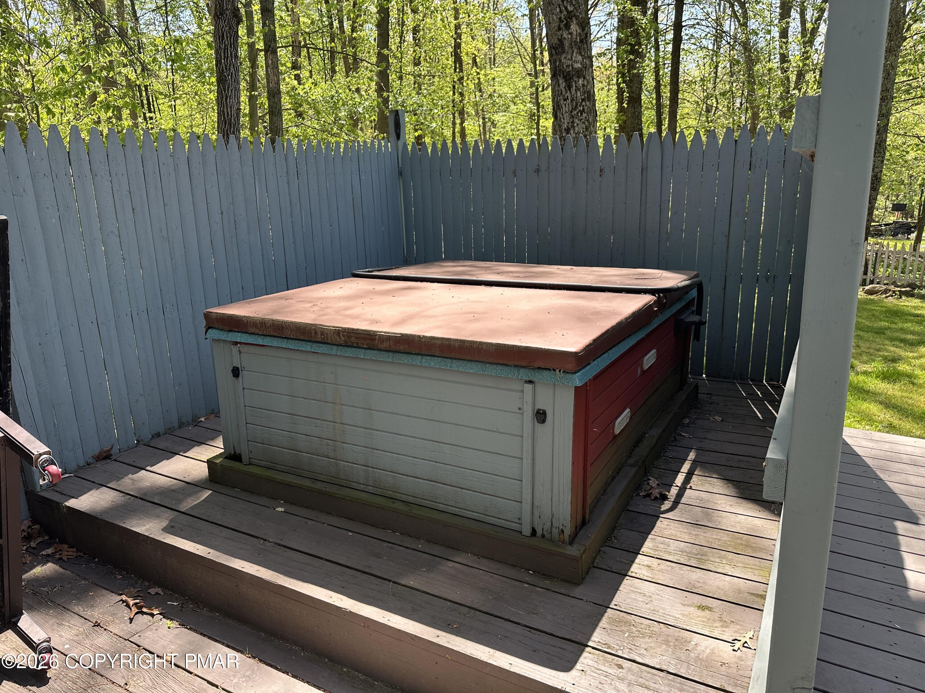 351 Charles Folly Road Bartonsville, PA 18321 - Photo 25 of 29 a view of barbeque area with wooden fence