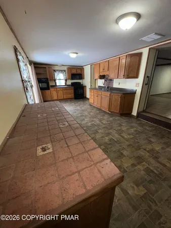 a view of a livingroom with furniture
