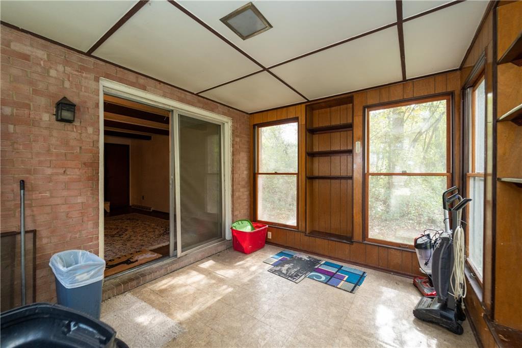 1050 Princeton Road Pittsburgh, PA 15205 - Photo 12 of 34 a bedroom with a bed and a large window