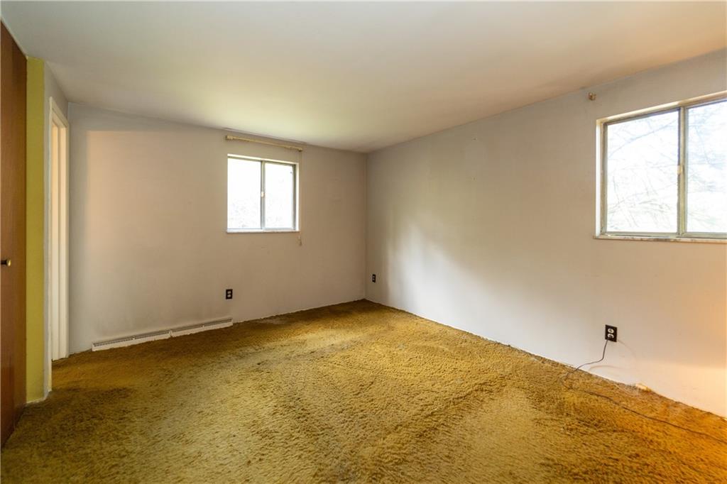 1050 Princeton Road Pittsburgh, PA 15205 - Photo 19 of 34 a view of an empty room with a window