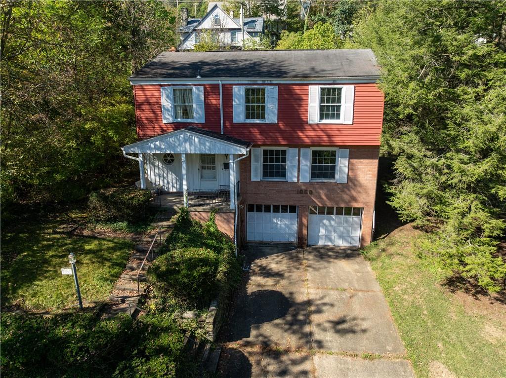 1050 Princeton Road Pittsburgh, PA 15205 - Photo 2 of 34 front view of a house with a yard