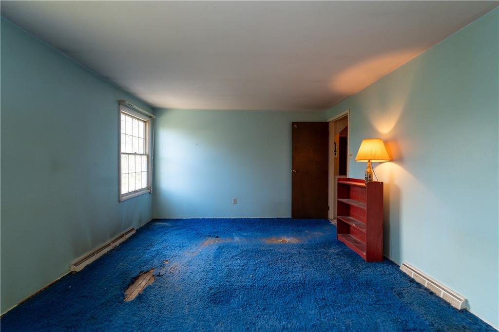 1050 Princeton Road Pittsburgh, PA 15205 - Photo 22 of 34 an empty room with windows
