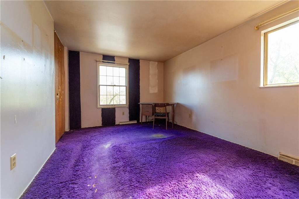 1050 Princeton Road Pittsburgh, PA 15205 - Photo 24 of 34 an empty room with windows