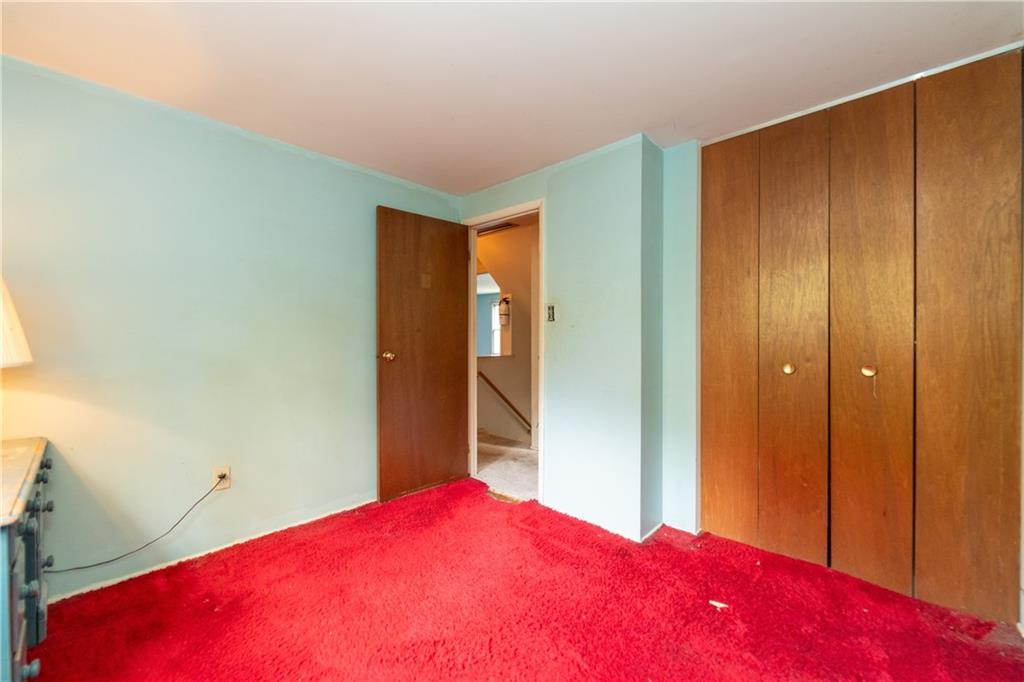 1050 Princeton Road Pittsburgh, PA 15205 - Photo 26 of 34 a bedroom with a bed and a dresser