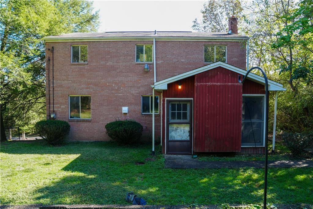 1050 Princeton Road Pittsburgh, PA 15205 - Photo 30 of 34 a view of a house with a yard
