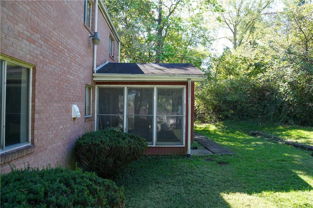1050 Princeton Road Pittsburgh, PA 15205 - Photo 31 of 34 a front view of a house with garden