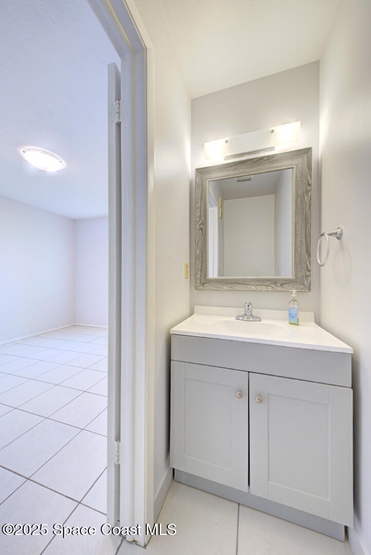 4749 Sisson Road Titusville, FL 32780 - Photo 9 of 30 powder room