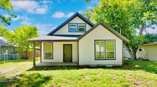a view of a house with garden