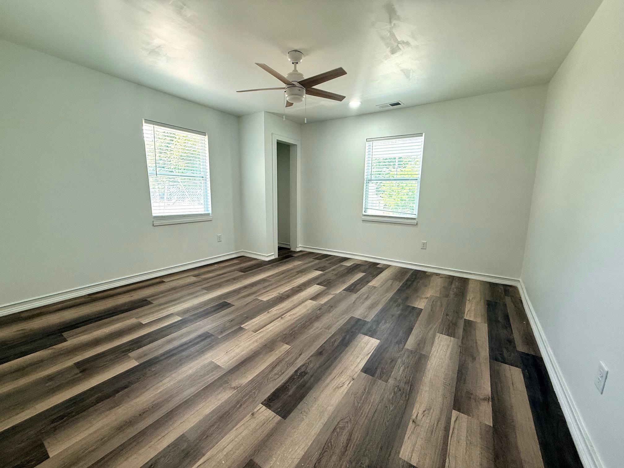 3054 Lotus Road Memphis, TN 38109 - Photo 13 of 29 a view of a room with wooden floor and a window
