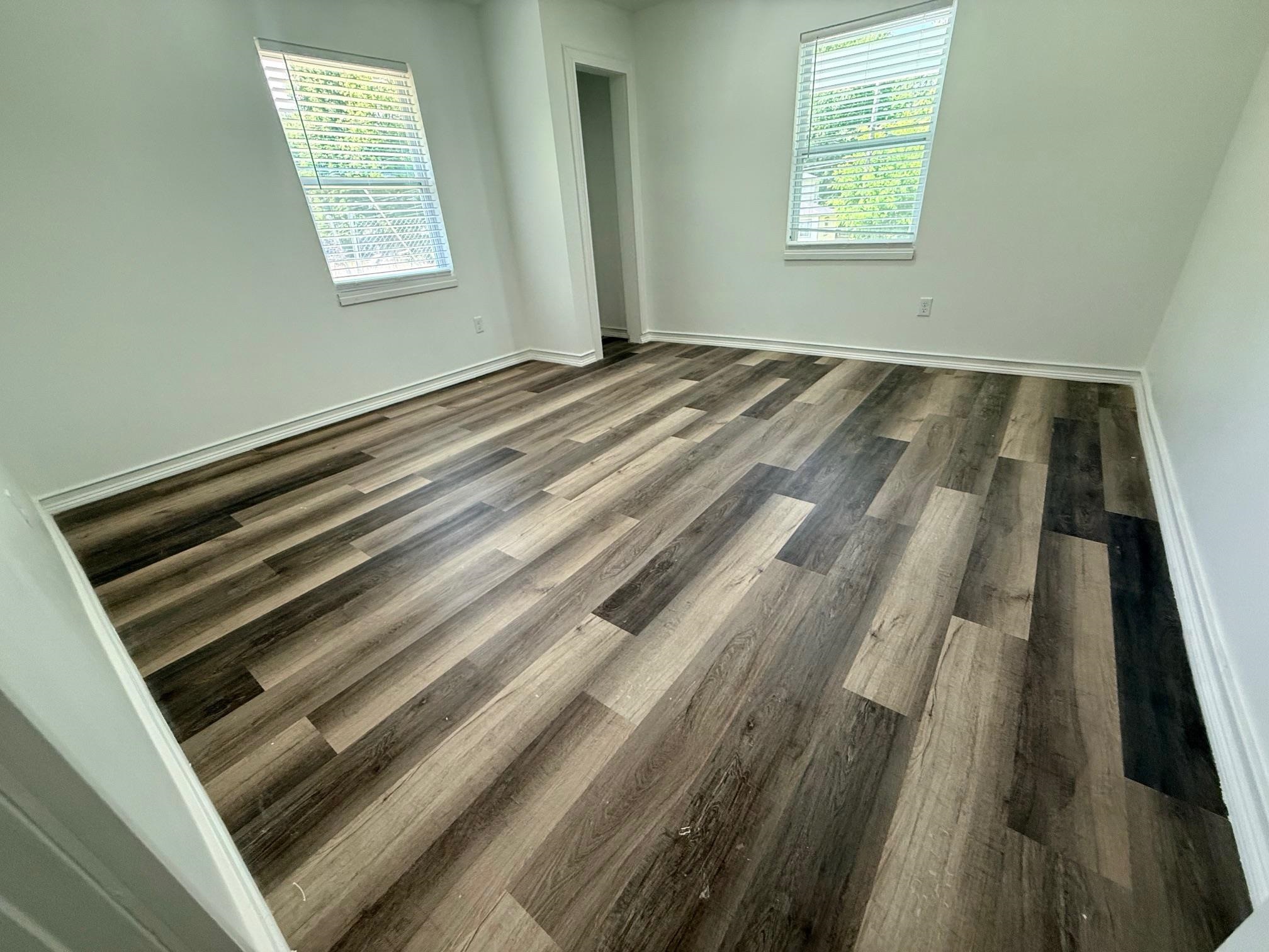 3054 Lotus Road Memphis, TN 38109 - Photo 14 of 29 a view of wooden floor in an empty room