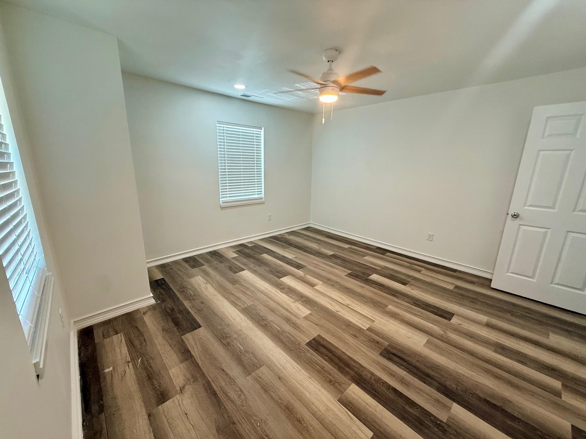 3054 Lotus Road Memphis, TN 38109 - Photo 19 of 29 a view of a room with wooden floor