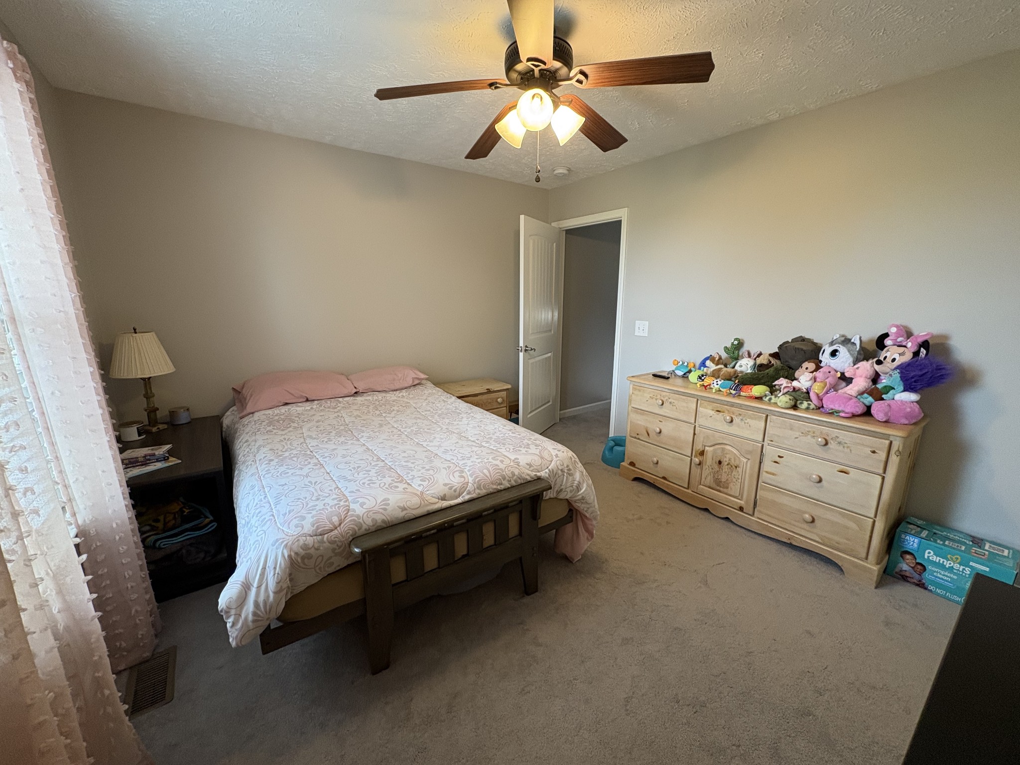 2455 New Holland Circle Murfreesboro, TN 37128 - Photo 9 of 12 a bedroom with a bed furniture and a chandelier