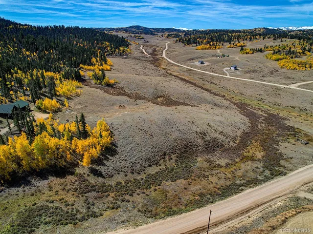 a view of a road with an ocean view