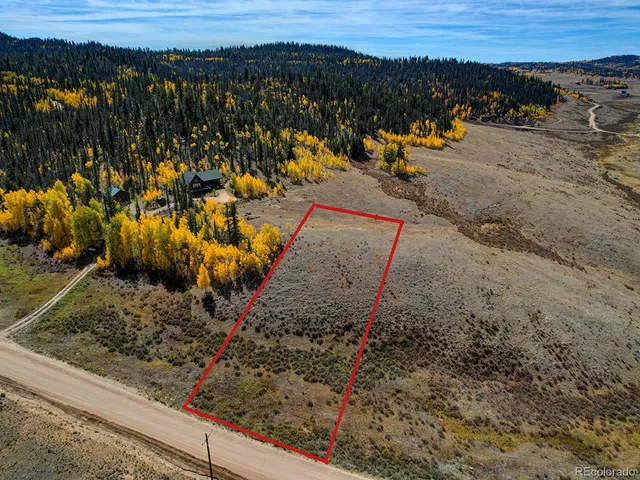 a view of a park with an ocean view