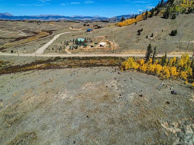an aerial view of a beach with beach