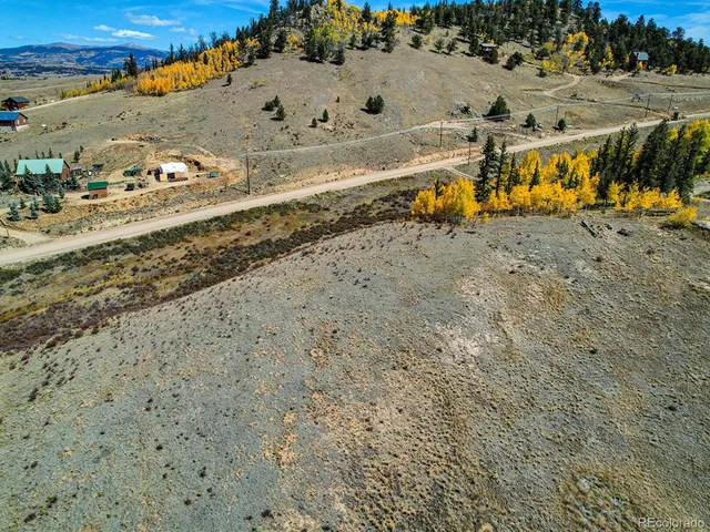 a view of a road with an ocean view