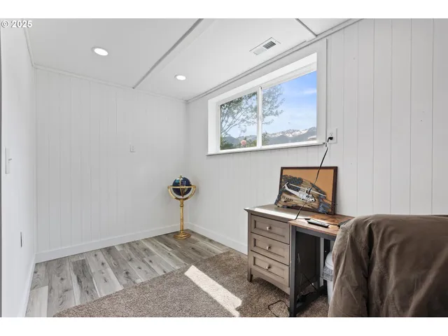 a view of a workspace with furniture