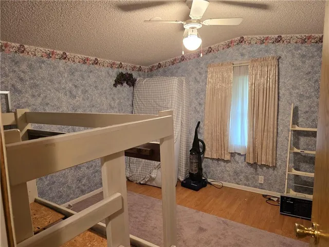 a view of a living room and entryway