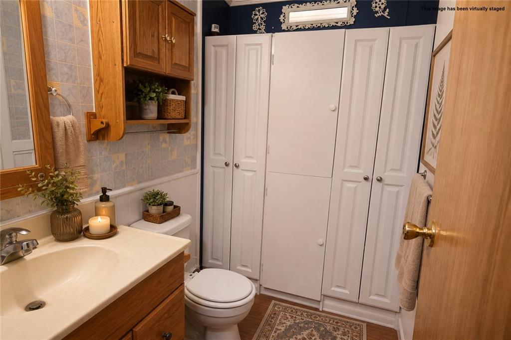 2495 Leach Road Linesville, PA 16424 - Photo 14 of 27 a bathroom with a sink toilet and shower