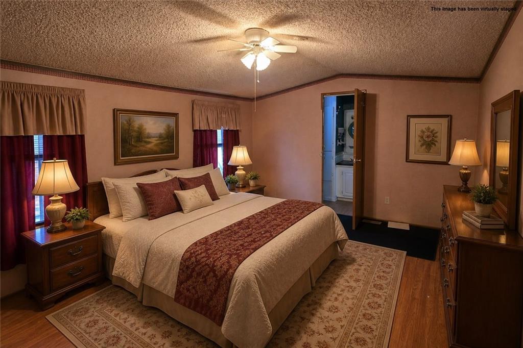 2495 Leach Road Linesville, PA 16424 - Photo 17 of 27 a bedroom with bed and wooden floor