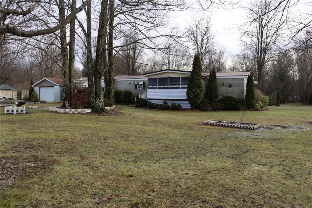 2495 Leach Road Linesville, PA 16424 - Photo 2 of 27 a view of a house with a yard