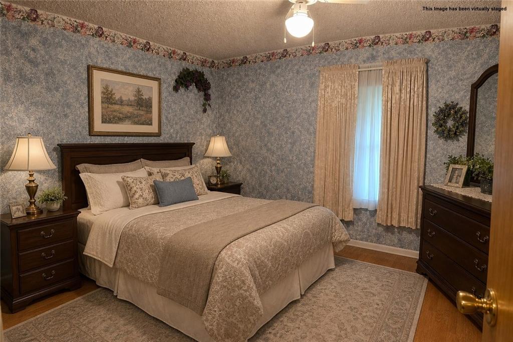 2495 Leach Road Linesville, PA 16424 - Photo 26 of 27 a bedroom with bed and wooden floor
